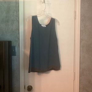 Top with metallic beading